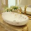 Glass washbasin vanity set with bathroom mirrors. 1