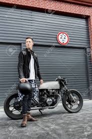 Handsome Rider Man In Black Leather Biker Jacket And Boots Near Stock Photo Picture And Royalty Free Image Image 82070654