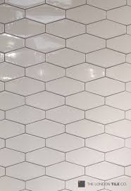 Black And White Hex Tile With Gray Grout We Re Loving These Bronte Irregular Hexagon Tiles Used With A Light Grey Grout White Hexagon Tiles Hexagon Tiles Black Hexagon Tile