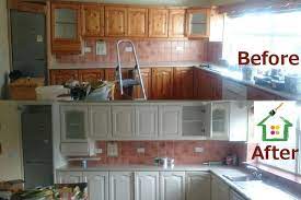 Cabinet refinshers will typically sand the cabinets, apply primer and paint and then add a top coat of lacquer which will be more resilient to chipping, fading, and scratches. Painting Respray Kitchen Cabinets Cork 30 M Jpg 1000 665 Painting Kitchen Cabinets Cost Of Kitchen Cabinets Old Kitchen Cabinets