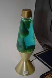 They are perfect for home or office. Vintage Lava Lamp With Gold Coloured Starlight Base Thoroughly Mesmerizing And Working At Time Of C