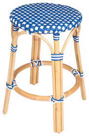 Often involving plants from coastal climates like rattan or seagrass, it associates with some pretty relaxing ideas and themes, such as Tobias Blue And White Rattan Counter Stool Tropical Outdoor Bar Stools And Counter Stools By Butler Specialty Company Houzz