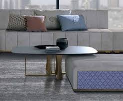 When you're purchasing a coffee table with seating cubes, one of your first considerations should be whether you want the seating cubes to match your coffee table. Coffee Table With Glass Top In The Barrel Shape Idfdesign