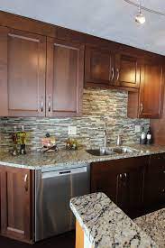 Santa Cecilia Light Granite Countertop Dark Brown Cabinet Mosaic Tile Backsplash Ha White Granite Countertops Backsplash With Dark Cabinets Dark Brown Cabinets