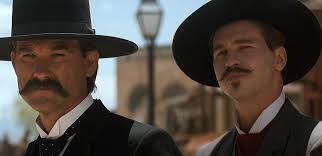 This movie version, starring kurt russell (wyatt earp), val kilmer (doc holliday), sam elliot (virgil tombstone is a riveting portrayal of the powers of good and evil and how these forces leave their. Tombstone Val Kilmer On How Kurt Russell Saved The Movie Den Of Geek