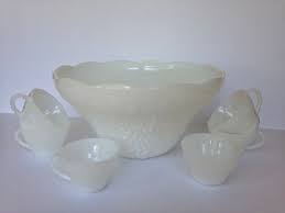 The large punch bowl sits proudly on top of the matching glass stand, adding height to tabletops and buffet displays, or if you'd rather you can turn the stand upside. Vintage White Milk Glass Punch Bowl And Cup Set Anchor Hocking Grape Pattern Vintage Punch Bowl Set One Punch B Punch Bowl Set Milk Glass White Milk Glass