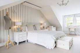 Of course, every feminine bedroom idea in pastel colors needs a bright point. Feminine Bedroom Indoors During Daytime Attic Interior Design Stock Photo 199357576