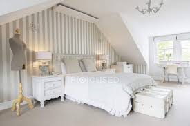 So follow the steps below to create a wonderful feminine world for yourself. Feminine Bedroom Indoors During Daytime Attic Interior Design Stock Photo 199357576