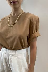 Padded shoulder tees were originally made by frankie shop but then many other brands decided to rock this idea, too. Muscle Tees The Padded Shoulders T Shirts The Fashion Request