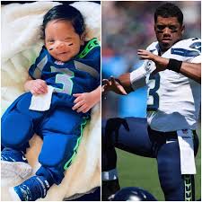 Russell wilson is a popular american football quarterback who has plied his trade with the national football league's seattle seahawks since he became a professional. Baby Win Rocks Blue Jersey To Support Dad Russell Wilson P M News