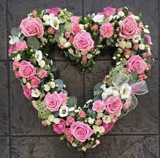 Crescenta valley flowers has a good number of funeral arrangements and sympathy flowers so you can always send your kindest condolences. Stunning Floral Open Heart Wreath Funeral Flower Arrangements Funeral Floral Arrangements Church Flower Arrangements