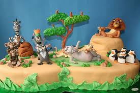 Madagascar parties are a blast because there's so much you can do with them. Madagascar Cake Madagascar Cake Cartoon Cake Kids Party Decorations