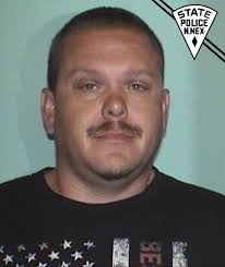 A 14-year-old fatally shot a 13-year-old girl. Now his father is