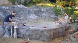 This is a tutorial on how to make a big fake boulder. Koi Pond Construction Part 5 Faux Artificial Boulders Waterfall Rebar Lath Youtube