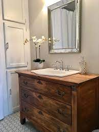 For a complete update, replace the sink, countertop and faucet the same time as the vanity cabinet. Pin By Jodi Quade On Cottage Rustic Bathroom Vanities Rustic Bathroom Ideas Farmhouse Custom Bathroom Vanity