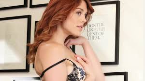 Molly Stewart strips for Playboy