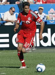 Adrian Cann of Toronto FC carries the ball against the Kansas City... News  Photo