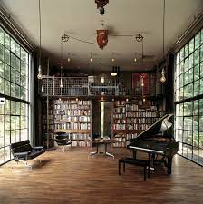The Brain By Olson Kundig Architects Is A 14 280 Cubic Foot Cinematic Laboratory Where The Client A Filmmaker C Elevated Home Steampunk Interior Home Library
