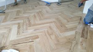 Sanding Process Of Herringbone Wood Floor After Installation Hardwood Floors Wood Floors Cheap Wood Flooring