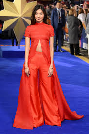 Gemma chan chats with access at the premiere of captain marvel and talks about her wild pink ralph & russo look. Gemma Chan Captain Marvel London Premiere Brandon Maxwell Gemma Chan Red Dress Outfit Accessories