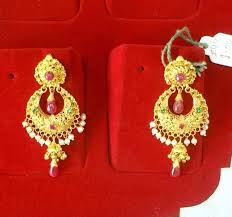 The pearl may be on the chandbali or hanging at the bottom. Gold Chandbali Earrings Iram S World Of Jewellery Facebook