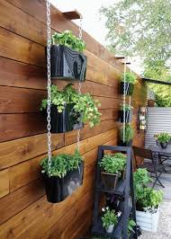 How To Garden In A Small Space Small Space Gardening Vertical Herb Garden Small Vegetable Gardens
