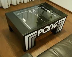 A premium coffee table that can play the mechanical version of the classic atari pong game, stream your music, and charge your phone the atari pong coffee table july 2, 2020 · Play Atari Pong On Your Coffee Table Ausretrogamer