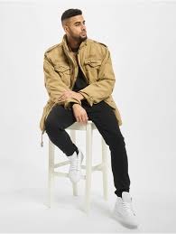 Olive, is the typical army jacket color, so if you prefer that the jacket. Brandit Herren Winterjacke M65 Standard In Beige 720108