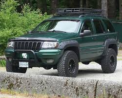 Love My 99 Jeep Grand Cherokee Westcoastjeeps Bushwacker 99grandcherokee Wj Punisher Gree Jeep Wj Jeep Grand Cherokee Jeep Grand Cherokee Accessories