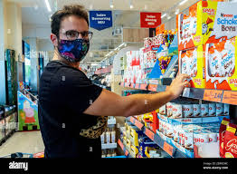 Berlin, Germany. Mature gay male shopping for groceries inside a local  supermarket wearing a ´protective´ facemask due to Corona Outbreak and  Stock Photo - Alamy