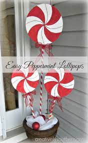 These pool noodle lollipops are super easy and inexpensive to make. Holiday Porch Decorations Christmas Lollipops Christmas Decorations Diy Outdoor Outside Christmas Decorations