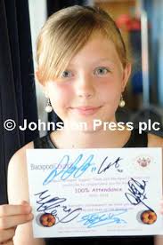 25015298-Pictures Martin Bostock Schoolchildren from Blackpool schools at a  special party at Blackpool football club to celebrate their 100%  attendance. St Nicholsas school.