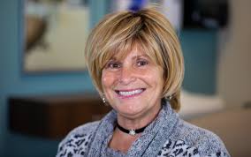 Memorial fund established by Coach Huggins advances West Virginia cancer  care