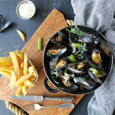 Food Travel Photography On Instagram Des Moules Marinieres Accompagnees De Frites Belges Preparees Traditionnellement In 2020 Food Cheese Board Cheese