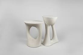 Blur the lines between art and function with this sculptural side table. Sculptural Concrete Side Tables From Souda