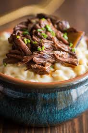 The mixture goes into the oven after combining the mac and cheese with bread crumbs on the top. Short Rib Mac And Cheese Baking Mischief