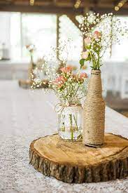 How To Create Those Stunning Handmade Wedding Table Decorations Be At O Wedding Centerpieces Budget Friendly Wedding Centerpieces Rustic Wedding Centerpieces