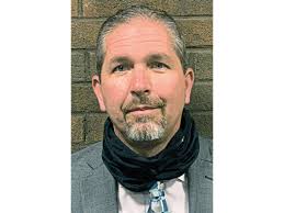 Council OKs promotion of service director