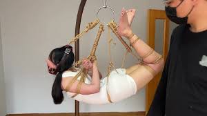 Asian Woman in Extreme Hogtie - BDSM Gif by GagTheGirl