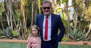 The warrant was issued by a judge for the arrest of a father after calling his biological female child his daughter, and referring to her with the pronouns she and her. Piers Morgan Shares Rare Photo Of Daughter As She Beats Him At Chess In 4 Moves Irish Mirror Online