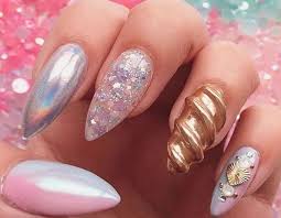 Hey youtube family this unicorn nail tutorial is special because i made the accent nail a unicorn horn 🦄 and i added some white glitter drip on her nails. So 3d Unicorn Nails Are A Thing Now