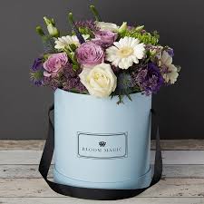 Select your perfect hatbox flowers. Bloom Magic Flower Delivery Ireland This Beautiful Flower Arrangement Contains Many Colourful Flo Floral Arrangements Flowers Bouquet Gift Get Well Flowers