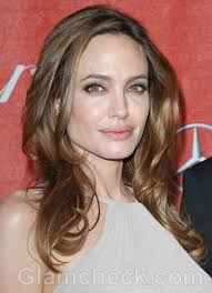 Departs the premiere for the film 'ocean's thirteen' at the palais des. Angelina Jolie Stately In Grey At Iffa Gala