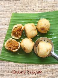 Masala seeyam or masala paniyaram is a chettinad delicacy which is a replacement to the vada in many chettinad feast. Seeyam Recipe Suzhiyam Suzhiyan Recipe Diwali Special Recipes