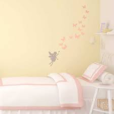 Perhaps with a painted mural on the wall, fairy lights and plenty of fairy toys that you could attach to little swings or faux branches. Fairies And Butterflies Wall Sticker Fairy Wall Stickers Stickerscape Uk