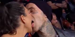 Officials have not confirmed this yet. Kourtney Kardashian And Travis Barker French Kiss On Camera During Ufc Match Newsbinding