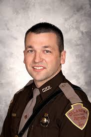 CHIEF'S AWARD Trooper Cole Patterson #599 On February 8th, 2017, Trooper Cole  Patterson and Captain Brian Sturgill responded in an OHP helicopter to a  request from Norman Police Department to search for