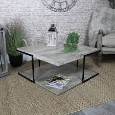It offers a spacious top as well. Square Industrial Concrete Style Coffee Table
