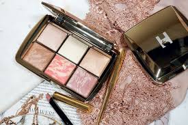 It is higher shine than the regular hourglass strobe powders, and once applied there are small flecks of silver pearl . Review Hourglass Ambient Lighting Edit Sculpture Pretty Is My Profession