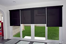 Easy to operate by just adjusting it with a rope on the left and right side of the curtain. Roller Shades On A Sliding Glass Door Yelp Sliding Door Blinds Sliding Door Room Dividers Patio Door Blinds